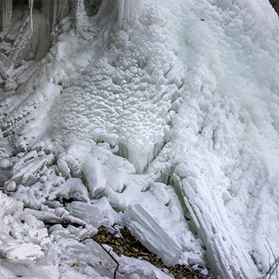 Ice formed by waterfall spray.