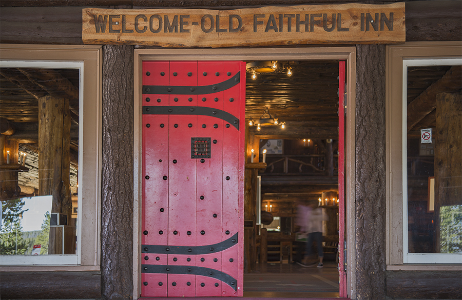 Red front doors of the Old Faithful Inn.